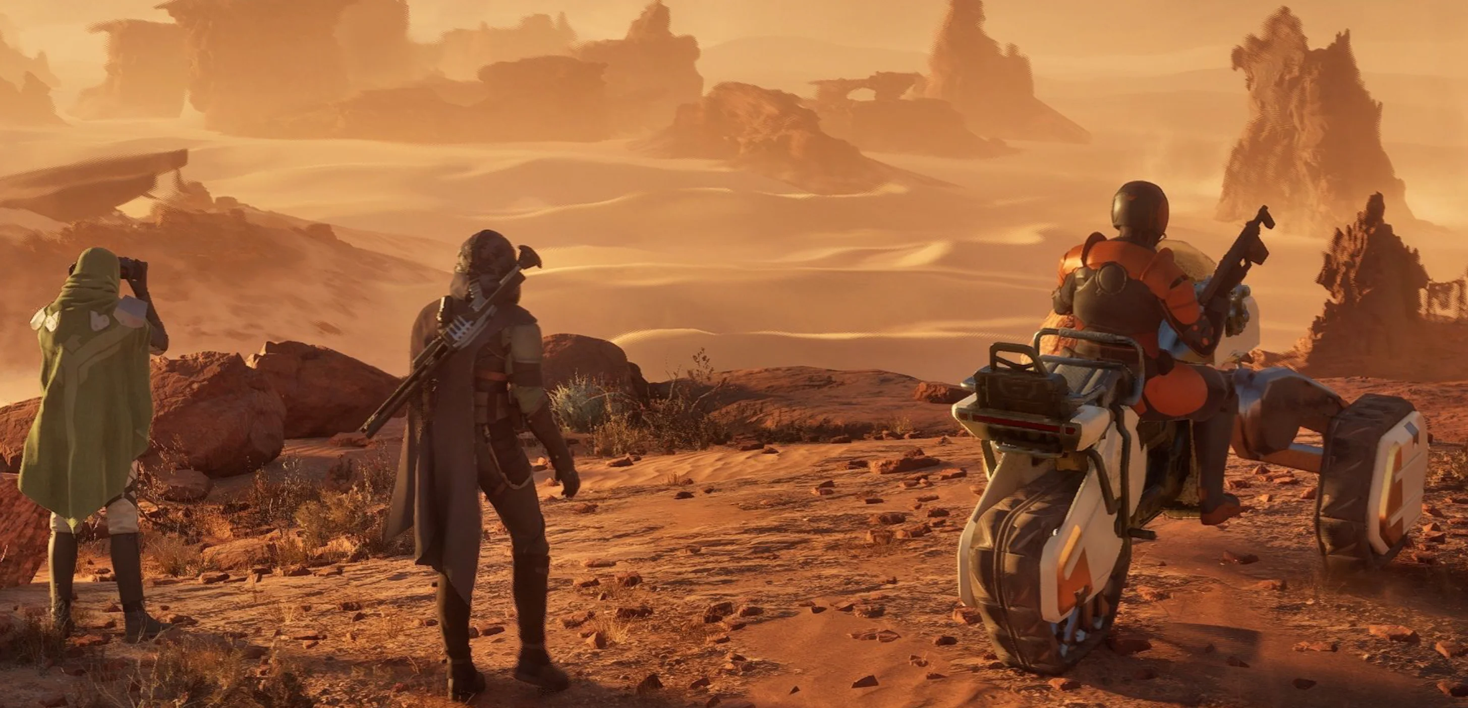 Group of players in different class outfits on Arrakis desert landscape